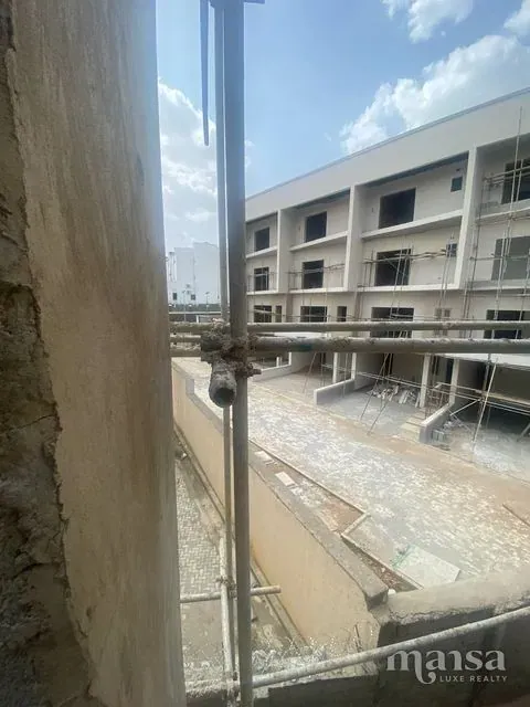 View from a balcony of neighbouring houses under construction