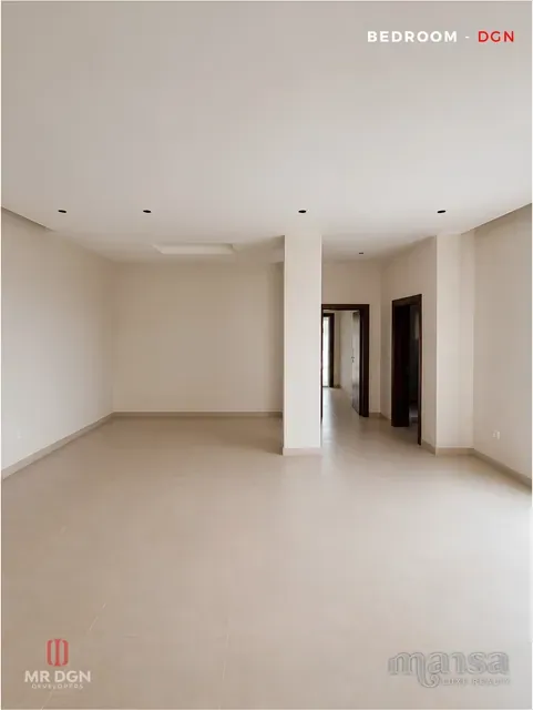 A bedroom opening onto the corridor in the Katampe Extension house, before completion